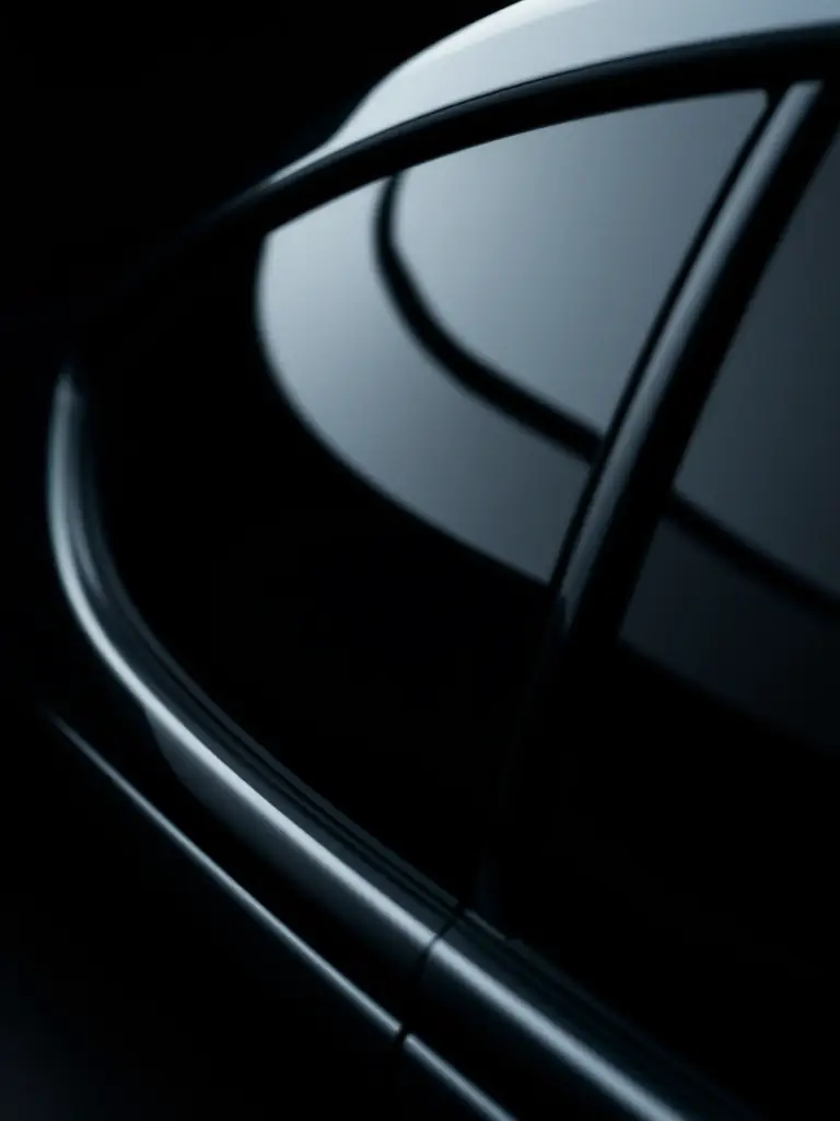 A close-up image of a luxury vehicle with tinted windows showcasing the smooth finish and clarity of the tint, highlighting the benefits of premium ceramic window tinting.